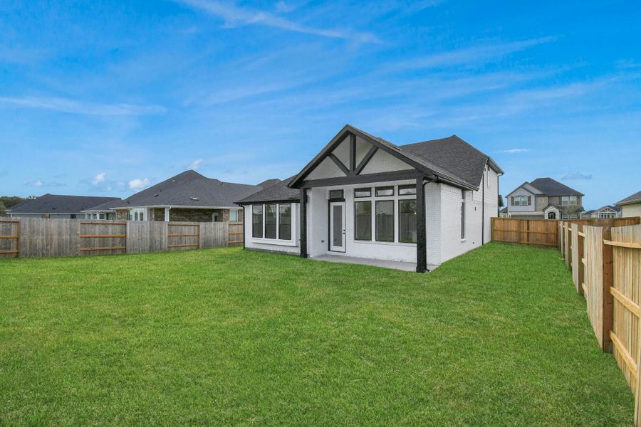 Exterior details and patio area of a home in Arabella on the Prairie: Premier Collection, Richmond (Image 18).