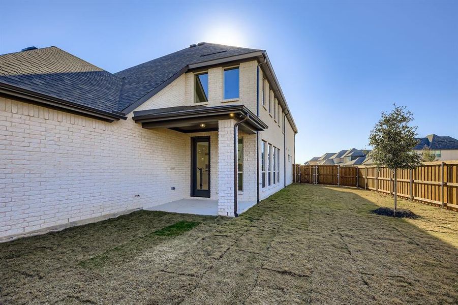 Exterior details and patio area of a home in Mosaic 40s, Celina (Image 20).