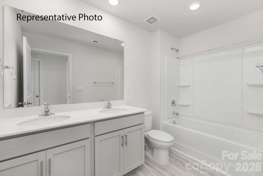 Furnished interior view inside a new home in Cardinal Creek, Charlotte (Image 21).