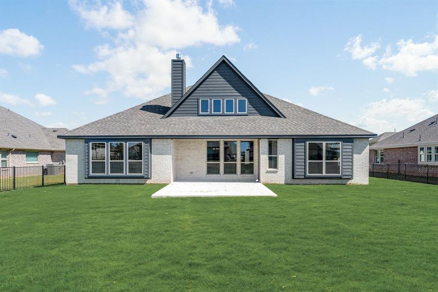 Exterior details and patio area of a home in Abe's Landing, Granbury (Image 18).