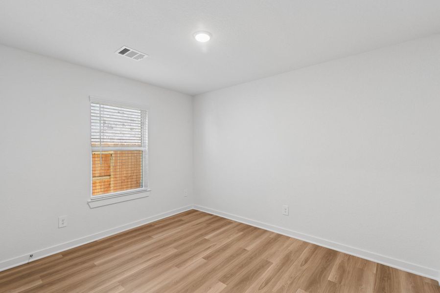 Spacious, unfurnished interior of a new home in Wildrye, Waller (Image 23).