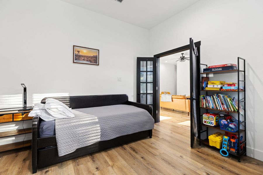 Bedroom featuring light wood-type flooring