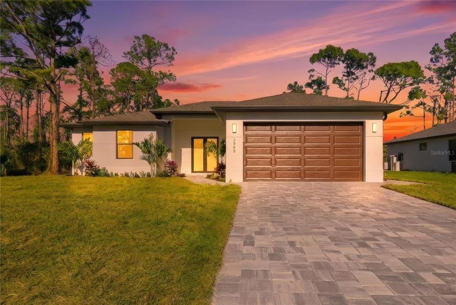 Front exterior of a new home in , North Port, FL, highlighting curb appeal (Image 19).