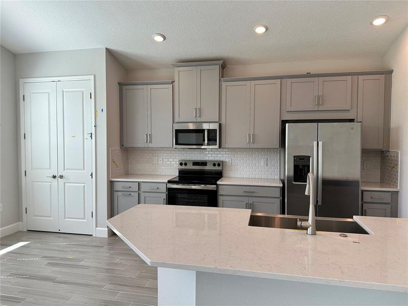 Furnished interior view inside a new home in Colbert Landings, Palm Coast (Image 4).