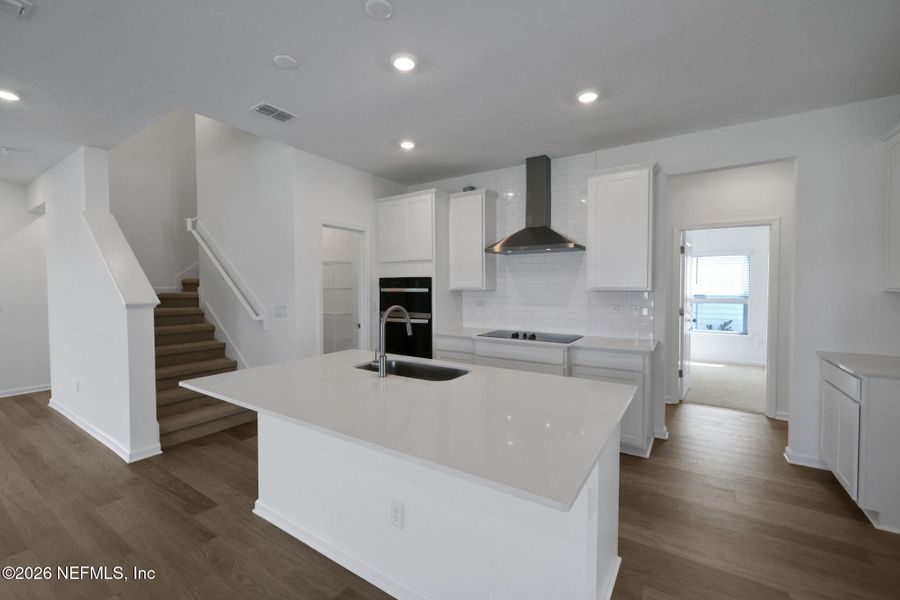 Furnished interior view inside a new home in Hyland Trail, Green Cove Springs (Image 11).