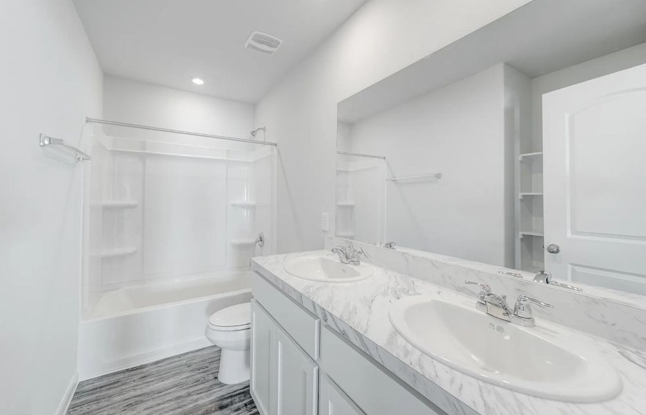 Front exterior of a new home in Rivers Crossing, Aiken, SC, highlighting curb appeal (Image 6). Front exterior of a new home in Rivers Crossing, Aiken, SC, highlighting curb appeal (Image 6).