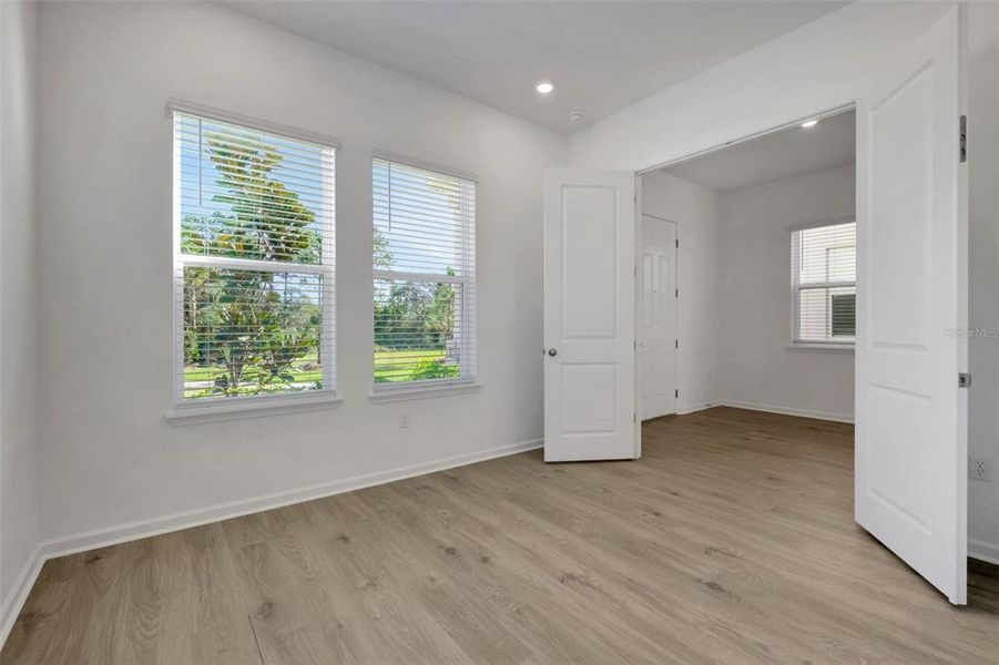 Spacious, unfurnished interior of a new home in Serenade at Ovation, Winter Garden (Image 37).