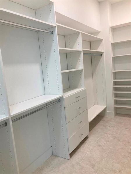 One of two master bedroom walk in closets One of two master bedroom walk in closets