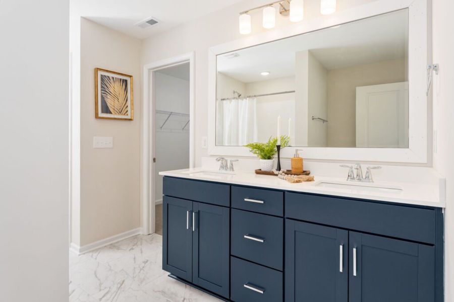 Representative furnished interior of a home built from the Naples by Stevens Fine Homes in River Tide Farms, Bolivia (Image 11).