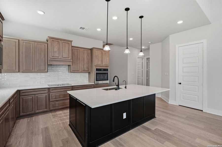 Furnished interior view inside a new home in Alsatian Oaks, Castroville (Image 30).