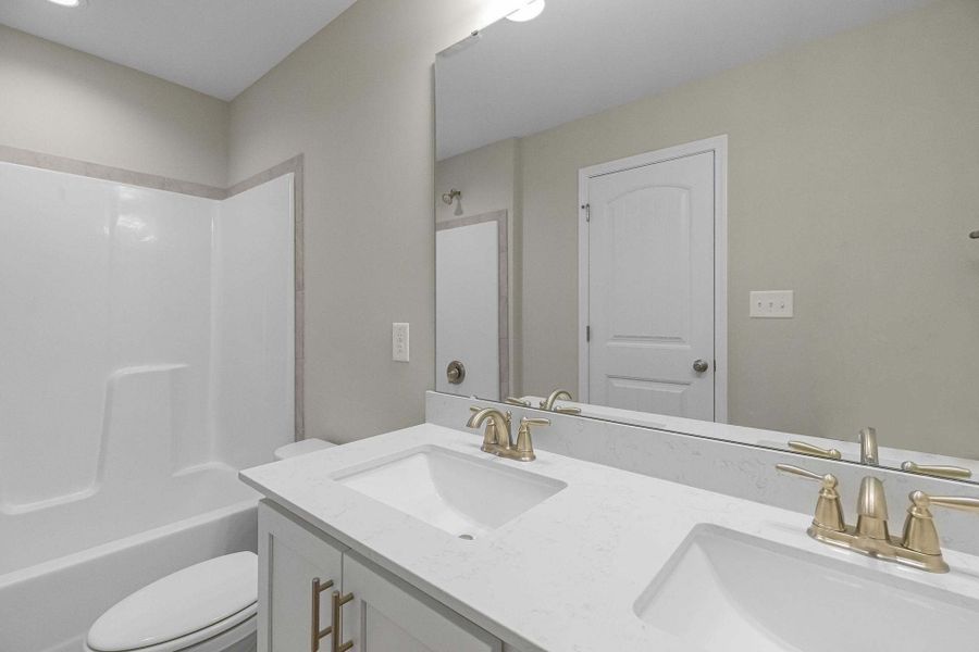 Representative furnished interior of a home built from the Magnolia by Caviness & Cates Communities in Bartlett Manor, Youngsville (Image 193).