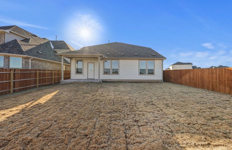 Exterior details and patio area of a home in Saddleback at Santa Rita Ranch, Liberty Hill (Image 3).