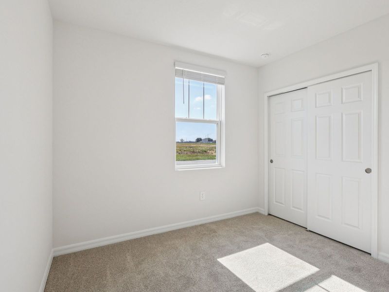 Spacious, unfurnished interior of a new home in The Meadow at Crossprairie, St. Cloud (Image 10).