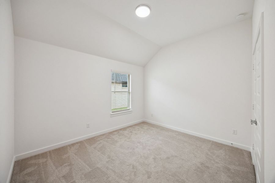 Bedroom in the Gilmour II home plan by Trophy Signature Homes – REPRESENTATIVE PHOTO