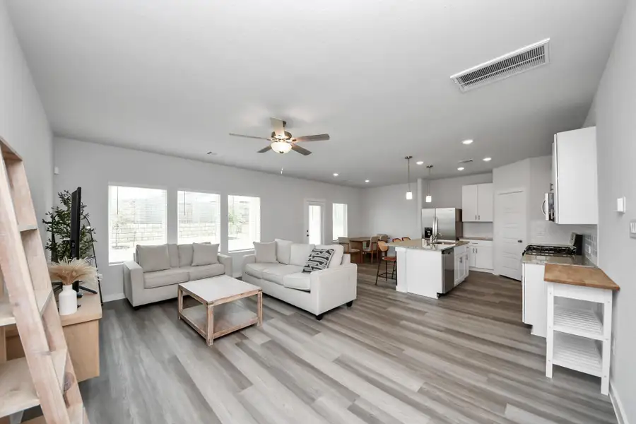 Furnished interior view inside a new home in Montgomery Oaks - Premier, Conroe (Image 4). Furnished interior view inside a new home in Montgomery Oaks - Premier, Conroe (Image 4).