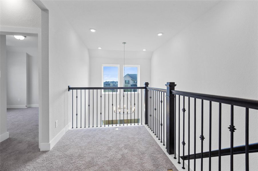 Head upstairs and enjoy the ample natural lighting from the high ceilings and entryway -- spacious secondary bedrooms and bathroom for family and guests.
