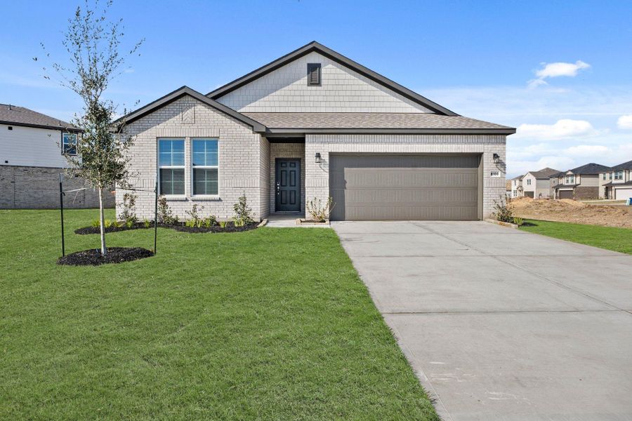 Front exterior of a new home in Pearlbrook, Texas City, TX, highlighting curb appeal (Image 19). Front exterior of a new home in Pearlbrook, Texas City, TX, highlighting curb appeal (Image 19).