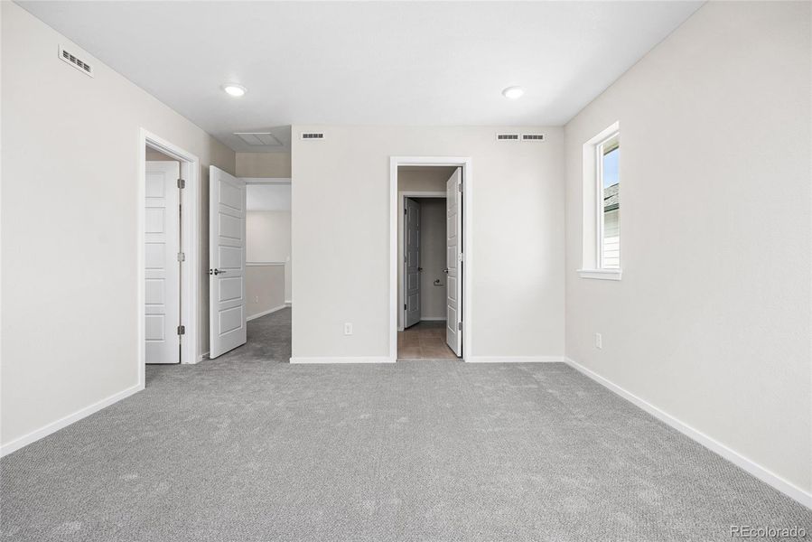 Spacious, unfurnished interior of a new home in Barefoot Village, Firestone (Image 21).