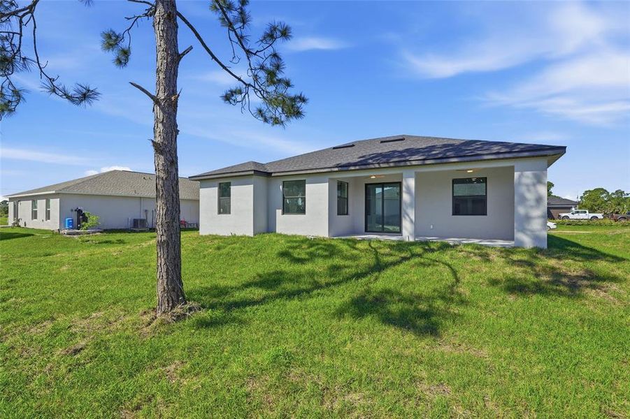 Exterior details and patio area of a home in , Lehigh Acres (Image 19). Exterior details and patio area of a home in , Lehigh Acres (Image 19).