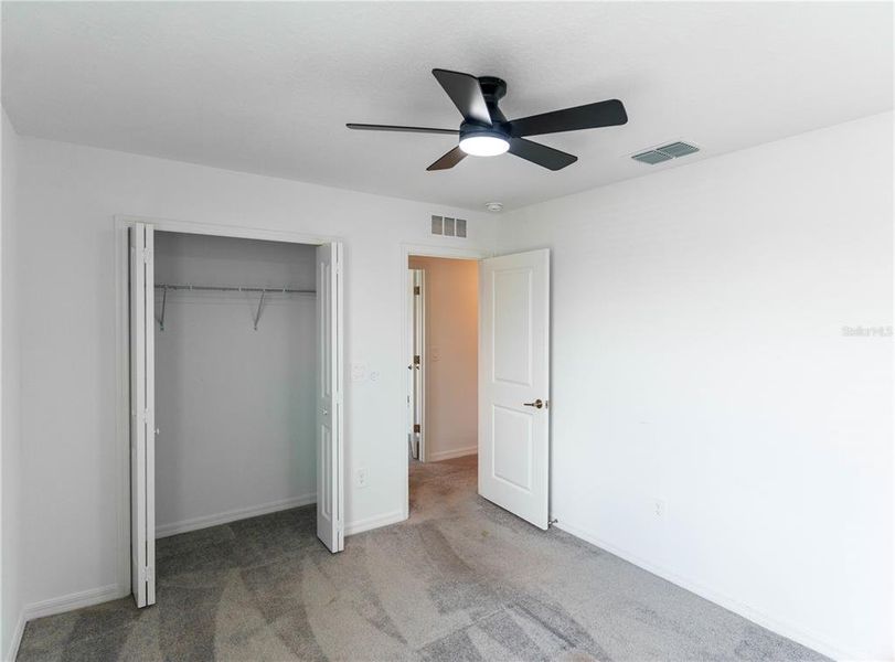 Spacious, unfurnished interior of a new home in The Isle of Avalon, Spring Hill (Image 34).