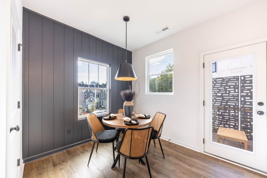 Representative furnished interior of a home built from the Myka TH by True Homes in Village at Reedy Creek Townhomes, Charlotte (Image 5).