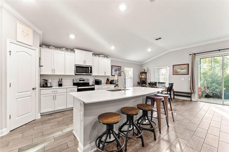 Furnished interior view inside a new home in Sawmill Branch, Palm Coast (Image 27).