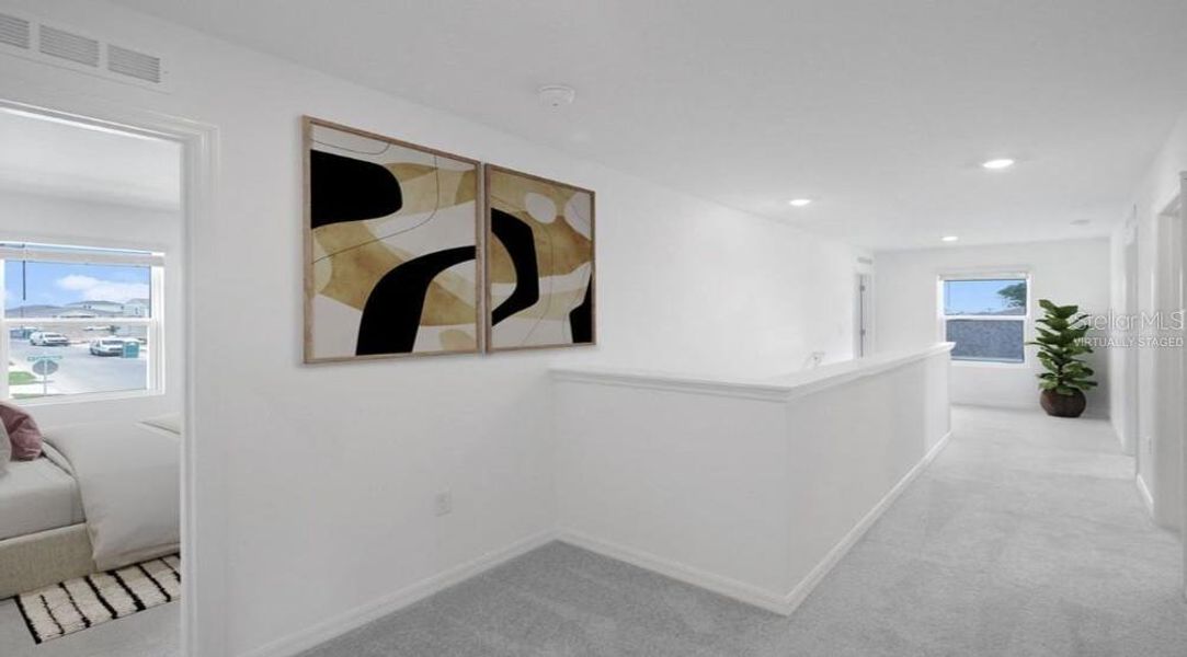 Furnished interior view inside a new home in Waterstone, Groveland (Image 4). Furnished interior view inside a new home in Waterstone, Groveland (Image 4).