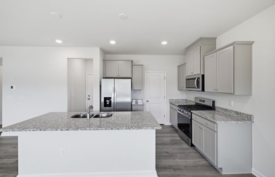 Furnished interior view inside a new home in Saunders Farm, Willow Spring (Image 6).