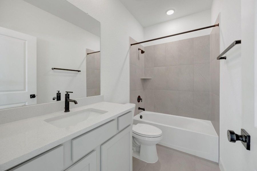 Furnished interior view inside a new home in Pomona - Grove Row Collection, Manvel (Image 9).