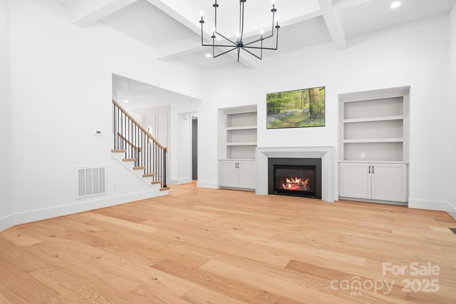 Built ins and coffered celing in family room