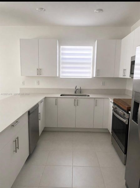 Furnished interior view inside a new home in , Miami (Image 7).