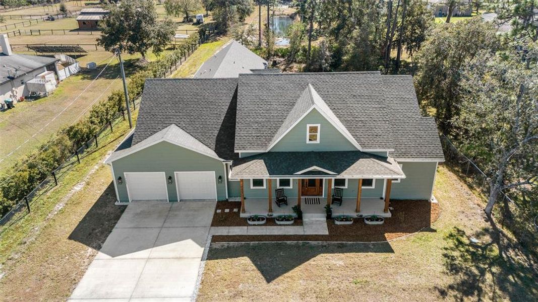 Front exterior of a new home in , Orlando, FL, highlighting curb appeal (Image 26). Front exterior of a new home in , Orlando, FL, highlighting curb appeal (Image 26).