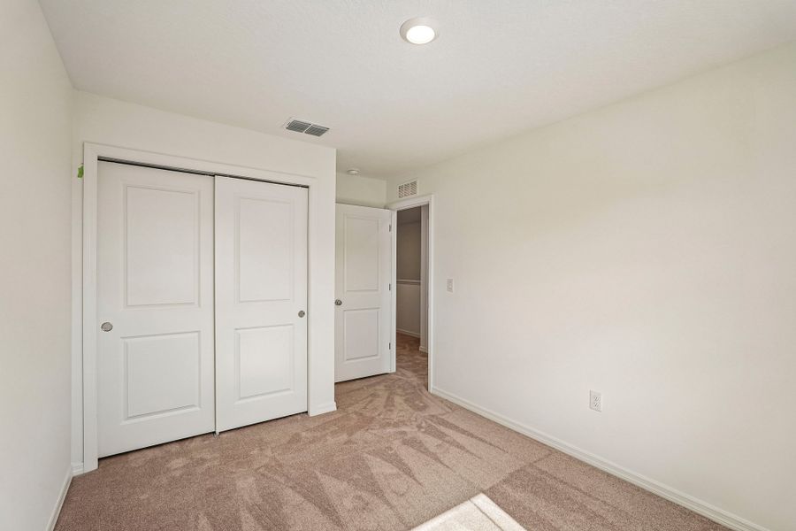 Spacious, unfurnished interior of a new home in The Towns at Tiburon, Nokomis (Image 13).