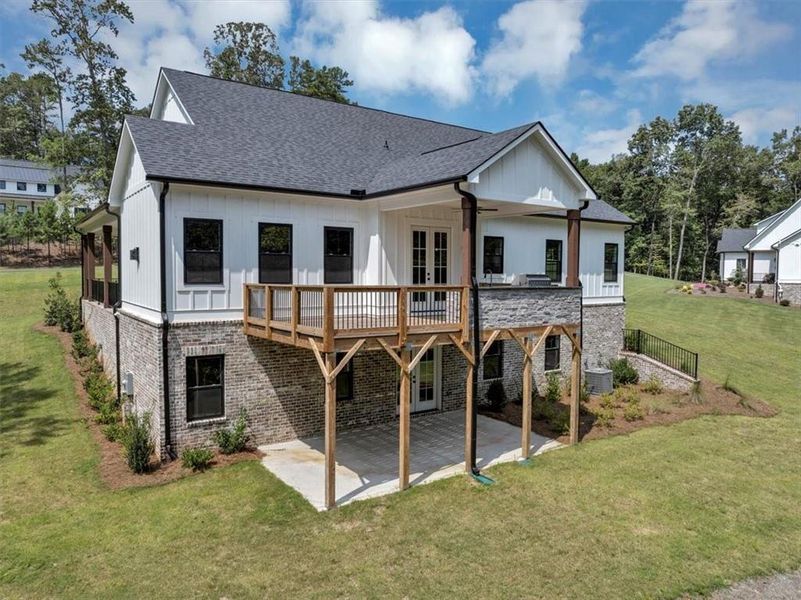 Front exterior of a new home in , Ball Ground, GA, highlighting curb appeal (Image 29).
