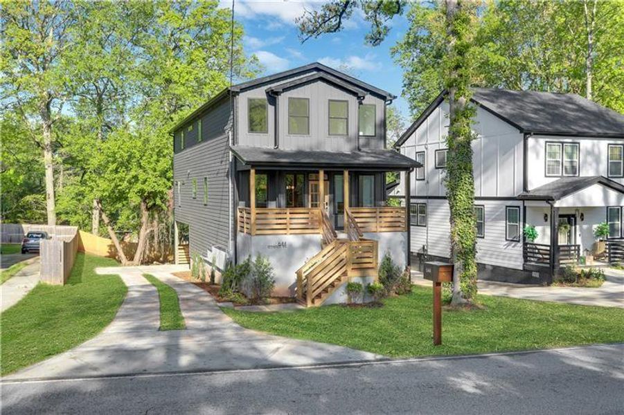 Front exterior of a new home in , Scottdale, GA, highlighting curb appeal (Image 29).