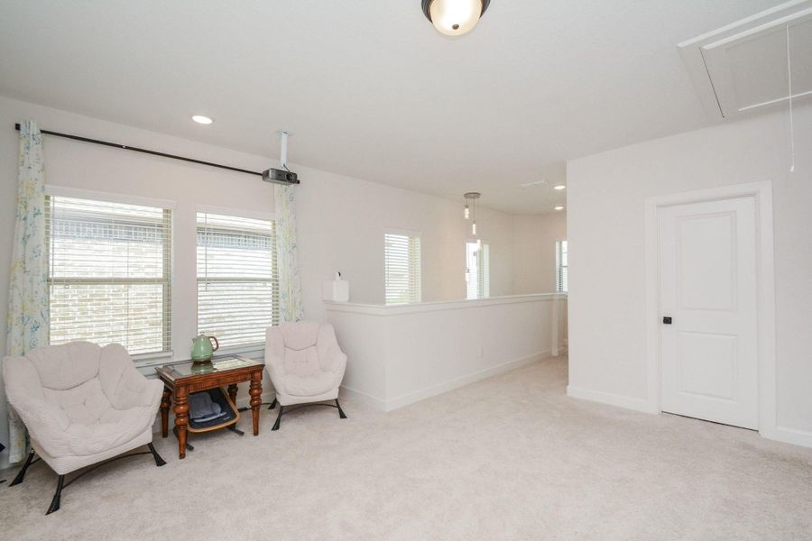Game room: Located on the second floor, this spacious game room offers endless possibilities as a media room, playroom, home office, fitness studio, or additional living area. Filled with natural light and thoughtfully positioned near the secondary bedrooms and full bathroom, it provides the flexibility to grow with your lifestyle.