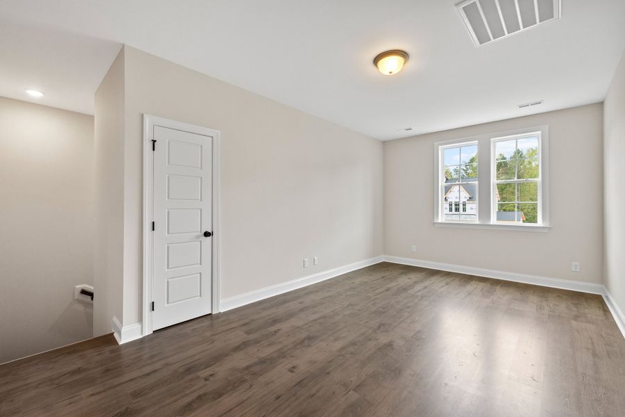 Representative unfurnished interior of a home built from the The Chandler by RobuckHomes in Baylee Ridge, Selma (Image 197).