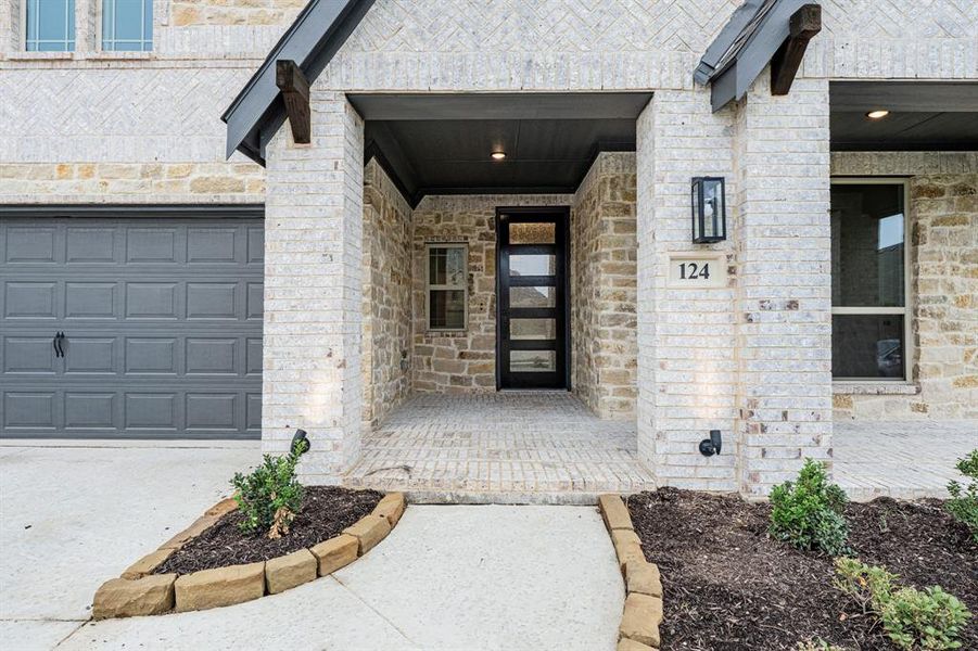 Front exterior of a new home in Hampton Park, Glenn Heights, TX, highlighting curb appeal (Image 22). Front exterior of a new home in Hampton Park, Glenn Heights, TX, highlighting curb appeal (Image 22).