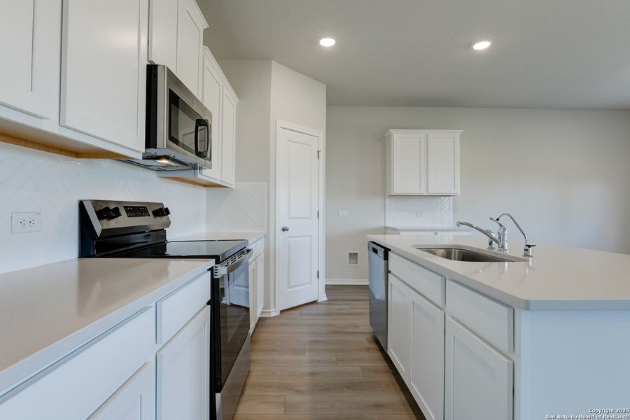Furnished interior view inside a new home in Meadows at Hennersby Hollow 40's, San Antonio (Image 11). Furnished interior view inside a new home in Meadows at Hennersby Hollow 40's, San Antonio (Image 11).