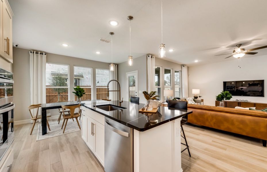 Large kitchen island with views of the gathering r