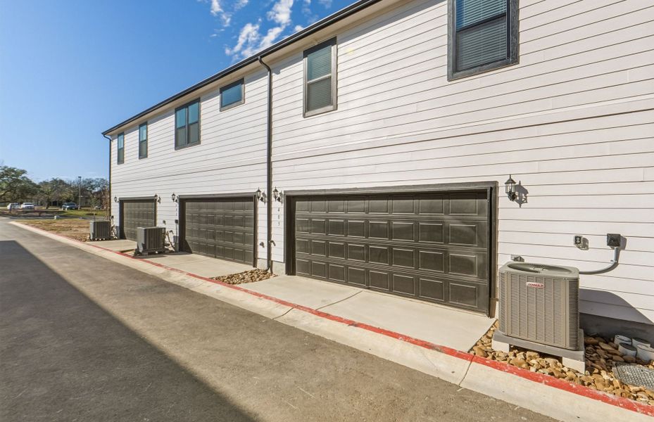 Exterior details and patio area of a home in Monarch on Main, Round Rock (Image 24).