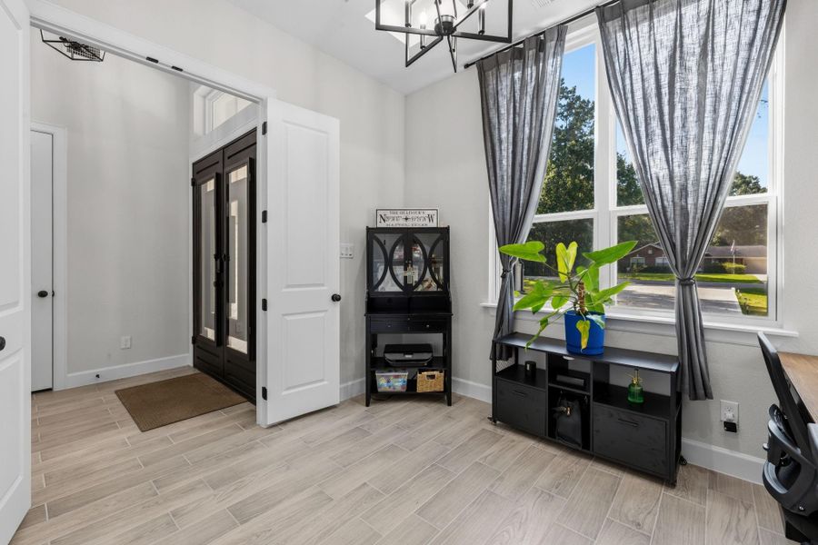 SECONDARY BEDROOM III / HOME OFFICE II — Featuring an accent ceiling and abundant natural light.