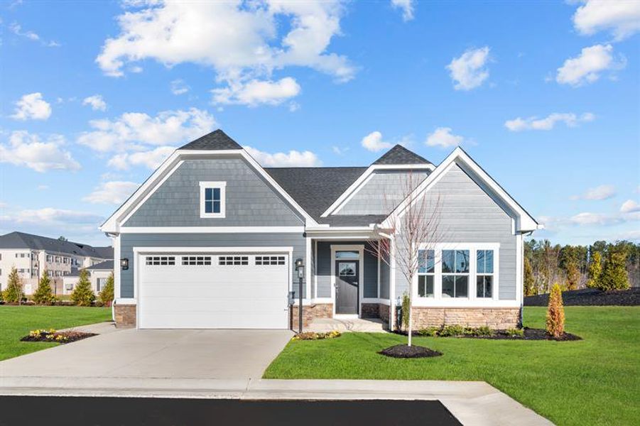 Representative exterior photo of a completed home built from the Bramante Two-Story by Ryan Homes in Sea Trail, Sunset Beach, NC (Image 1). Representative exterior photo of a completed home built from the Bramante Two-Story by Ryan Homes in Sea Trail, Sunset Beach, NC (Image 1).