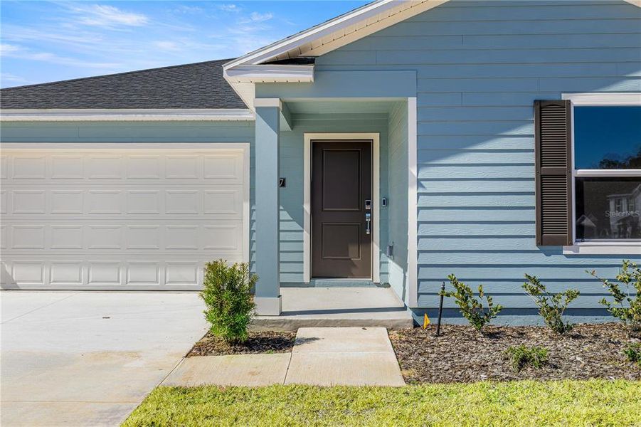 Exterior details and patio area of a home in Marion Ranch, Ocala (Image 6).