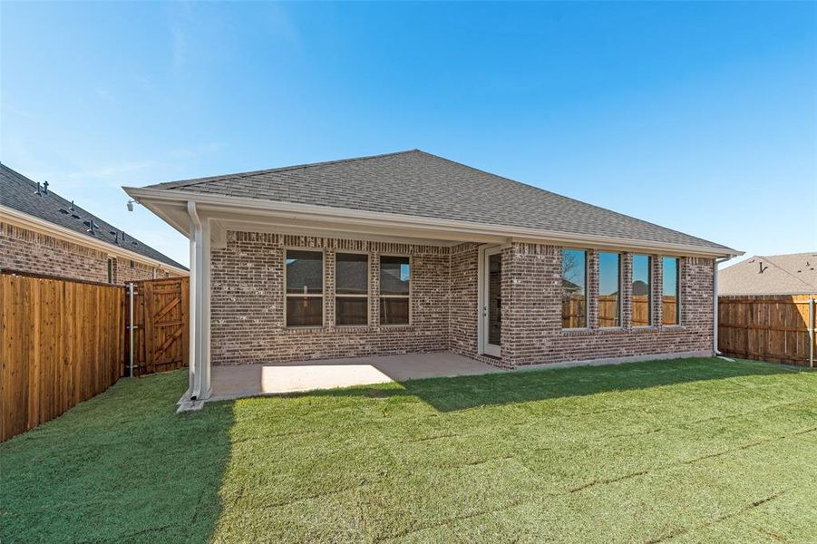 Front exterior of a new home in Walden Pond, Forney, TX, highlighting curb appeal (Image 17).