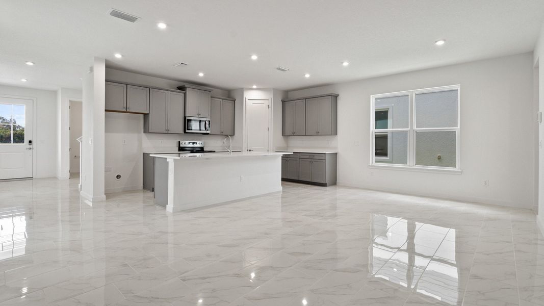 Mandarin view of the Kitchen and Living Area by DRB Homes in Trinity place by DRB Homes Orlando in Saint Cloud, FL Mandarin view of the Kitchen and Living Area by DRB Homes in Trinity place by DRB Homes Orlando in Saint Cloud, FL