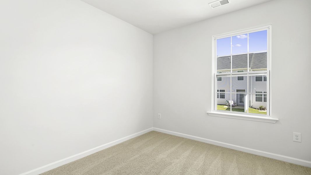 Spacious, unfurnished interior of a new home in North Village Townes, Greensboro (Image 15).