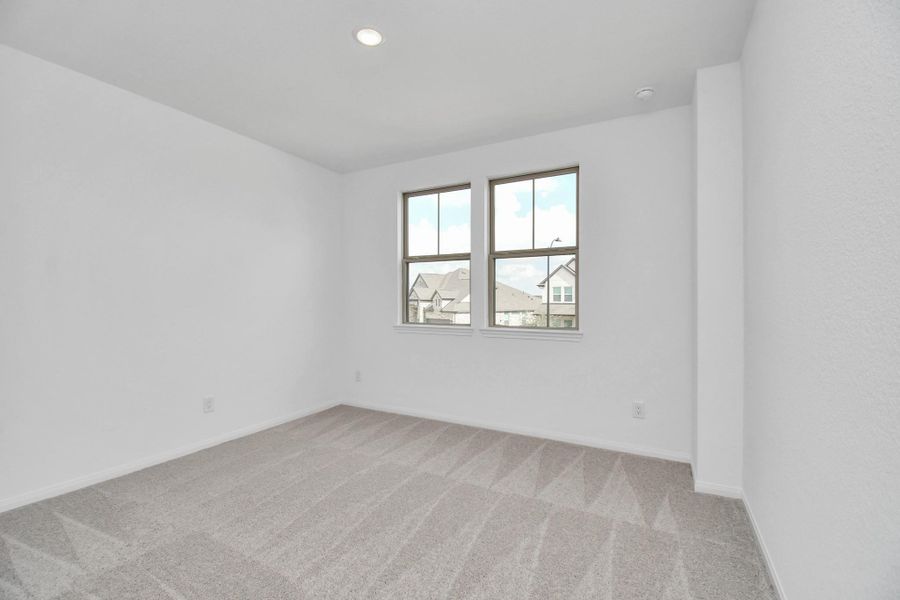 Spacious, unfurnished interior of a new home in 50' Traditional Homes at Elyson, Katy (Image 39).