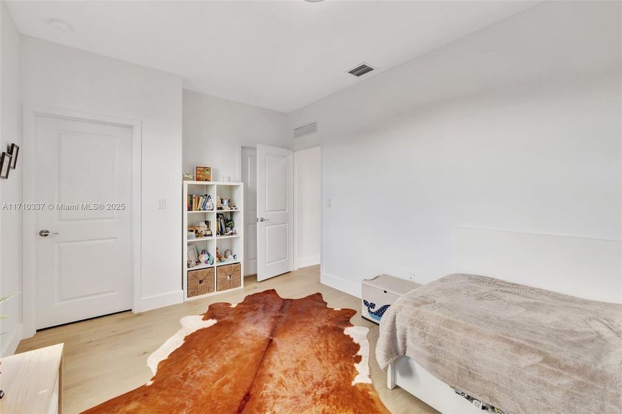 First bedroom upstairs overlooking front of home