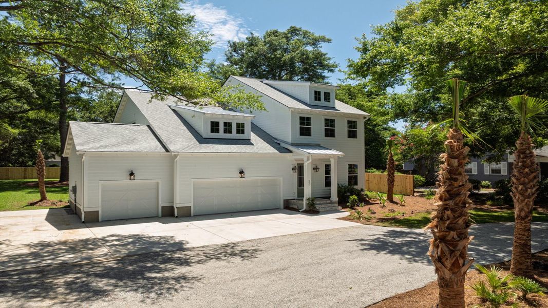 Front exterior of a new home in Bayview Acres, Mount Pleasant, SC, highlighting curb appeal (Image 1). Front exterior of a new home in Bayview Acres, Mount Pleasant, SC, highlighting curb appeal (Image 1).